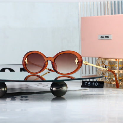 Miu Miu refined oval sunglasses, available in six colorways. 7510