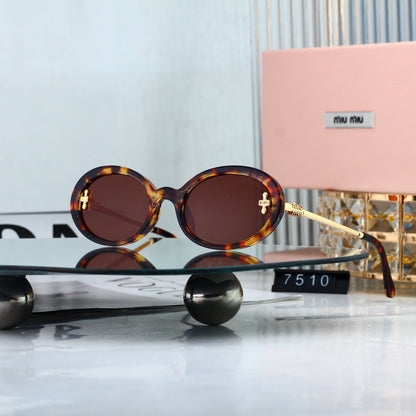 Miu Miu refined oval sunglasses, available in six colorways. 7510