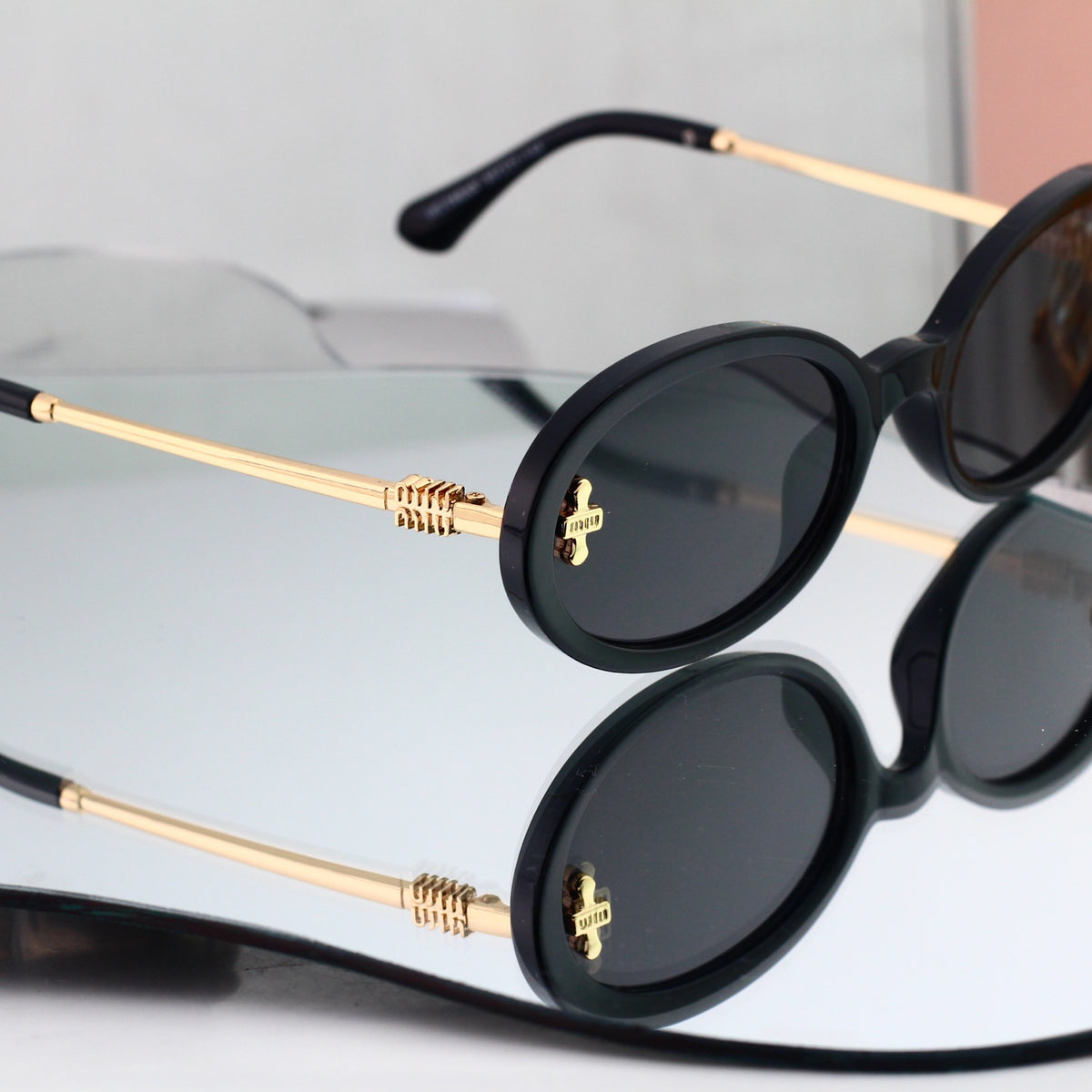 Miu Miu refined oval sunglasses, available in six colorways. 7510