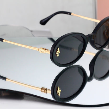 Miu Miu refined oval sunglasses, available in six colorways. 7510