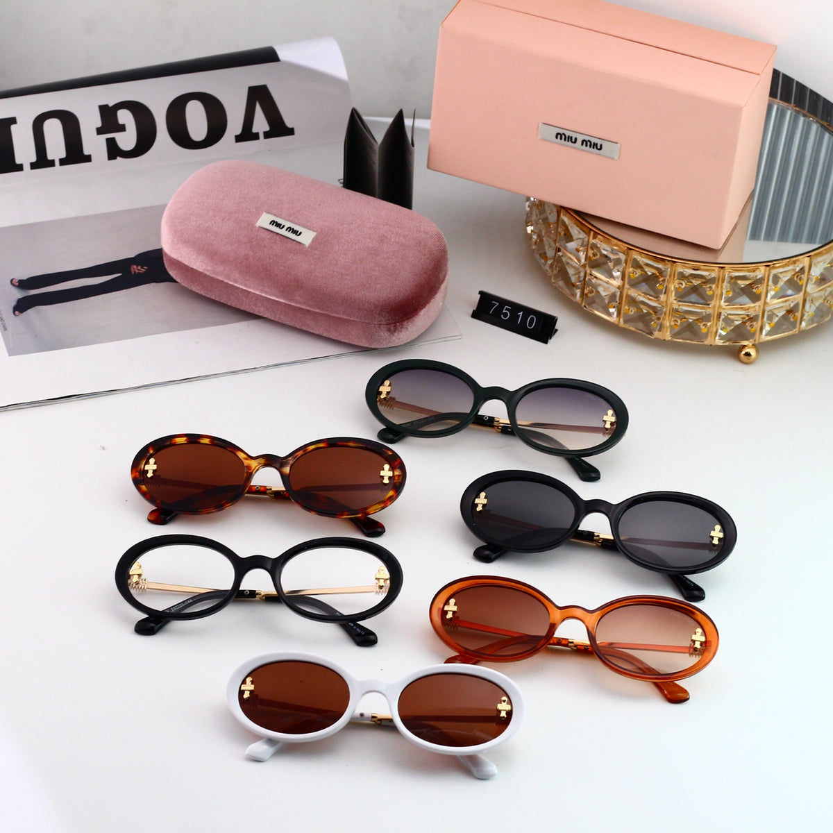 Miu Miu refined oval sunglasses, available in six colorways. 7510